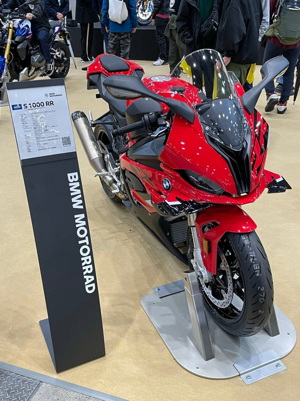 Red BMW S1000RR front fairing and winglets at the 2023 Tokyo Motorcycle Show