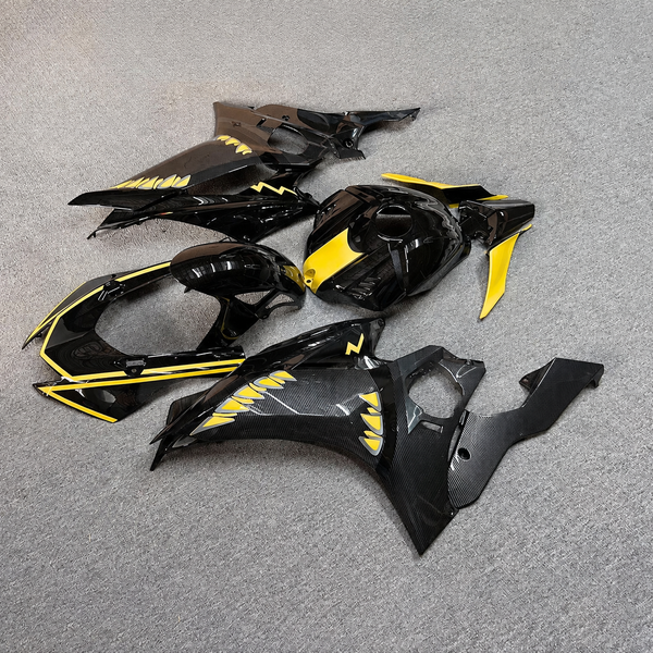 Carbon-look ABS fairings with yellow accents; catalog photograph retouched to remove watermark