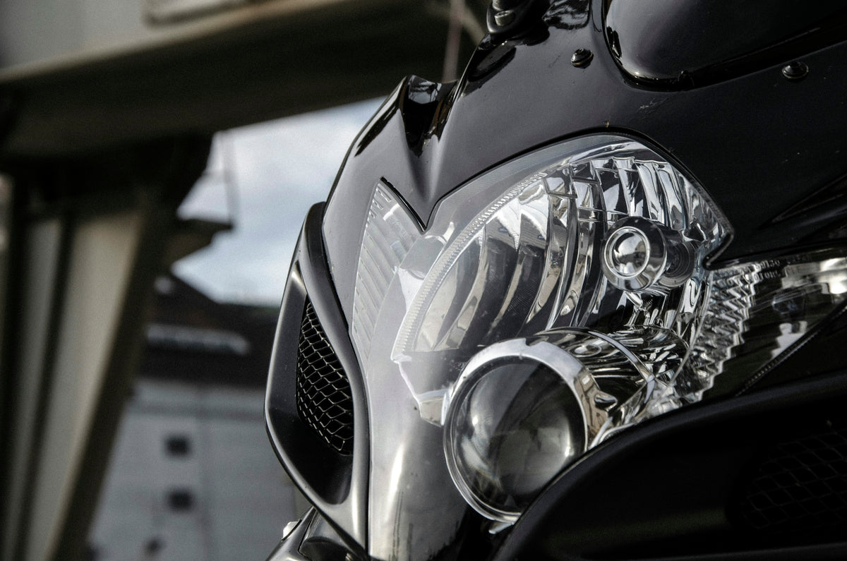 Suzuki GSX-R600 headlight and nose fairing close-up showing the lens edge and air intake