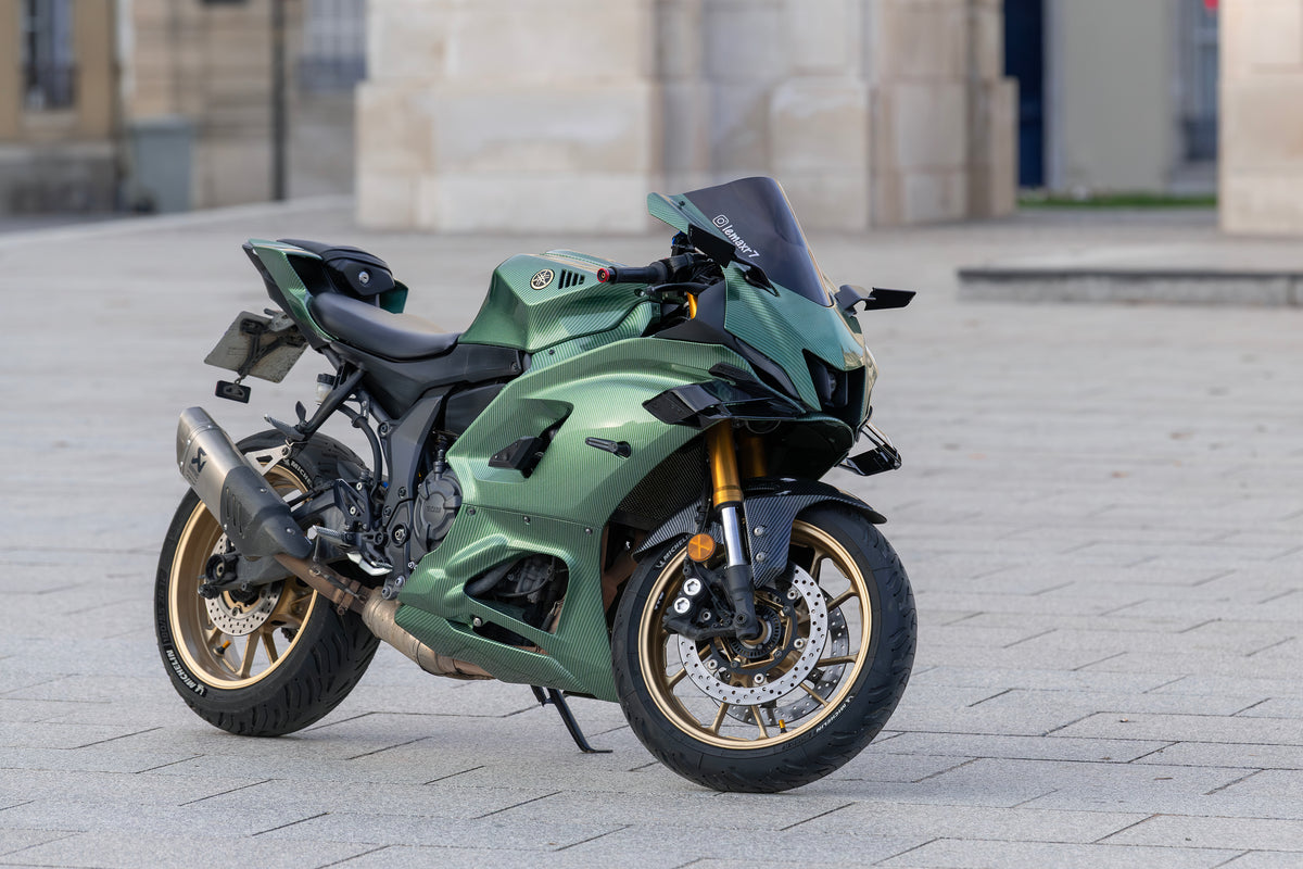 Modified Yamaha YZF-R7 parked outdoors, front three-quarter view; not a stock fitment reference