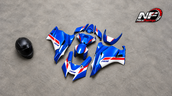 Blue, white and red YZF-R9 panel flat lay supplied by the owner, editorially reframed with a generated helmet and small NiceFairings logo; visual reference, not a kit contents or fitment record