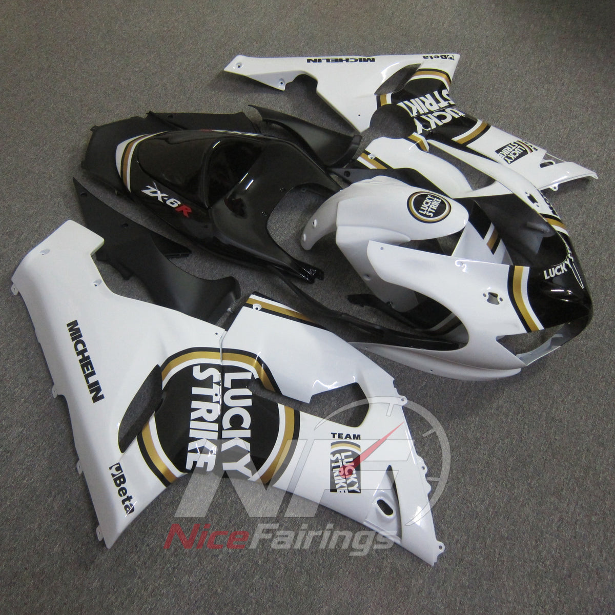 Kawasaki ZX6R 2005-2006 White gold circular emblems - angled view