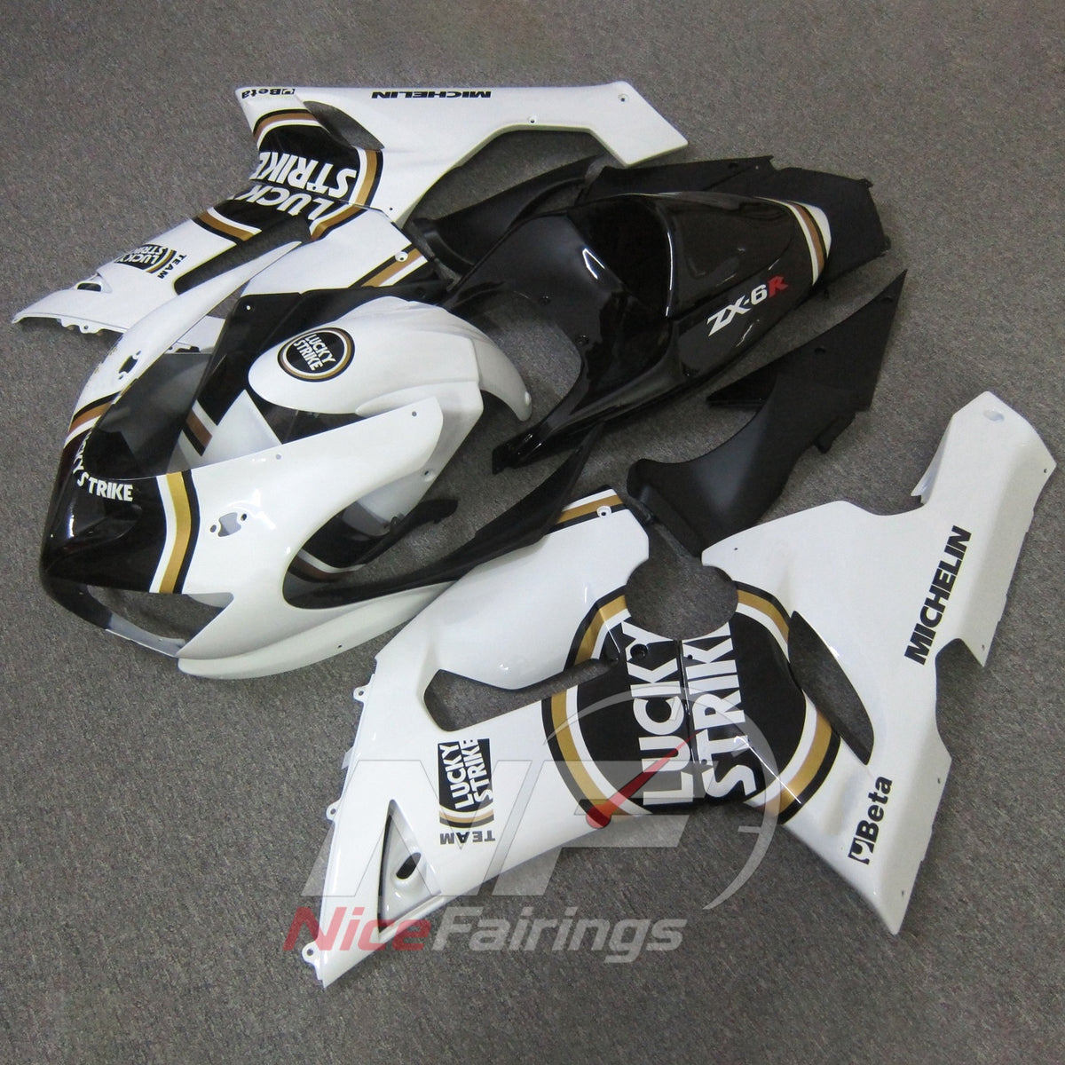 Kawasaki ZX6R 2005-2006 White gold circular emblems - angled view