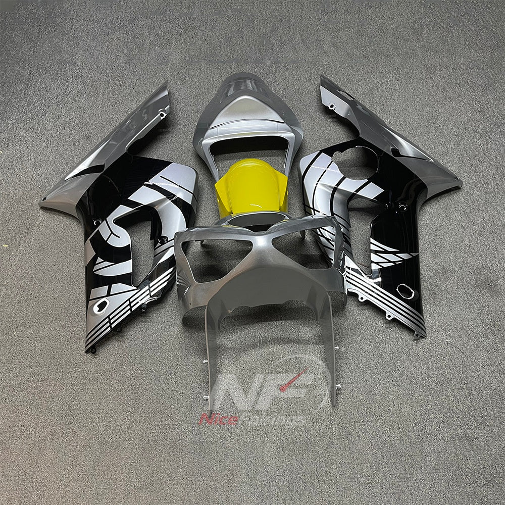 Kawasaki ZX6R 2003-2004 Silver-gray graphic panels with yellow center - front view