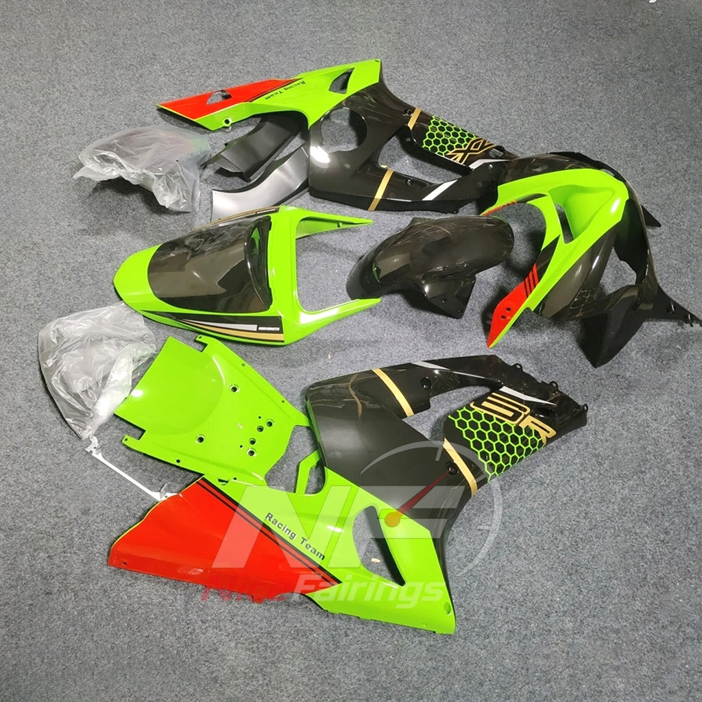 Kawasaki ZX6R 2003-2004 Lime, black and orange racing graphics - angled view