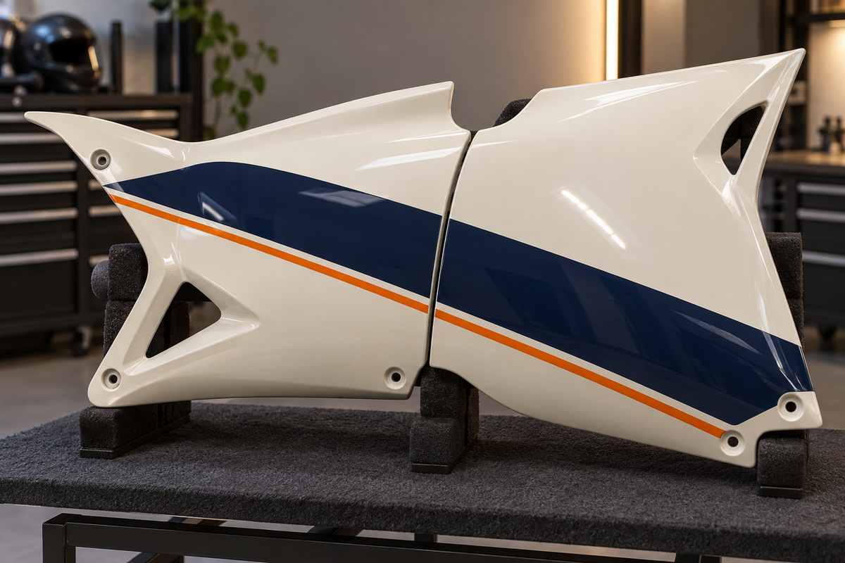 AI illustration: a navy and orange stripe crossing a seam between generic ivory fairing panels.