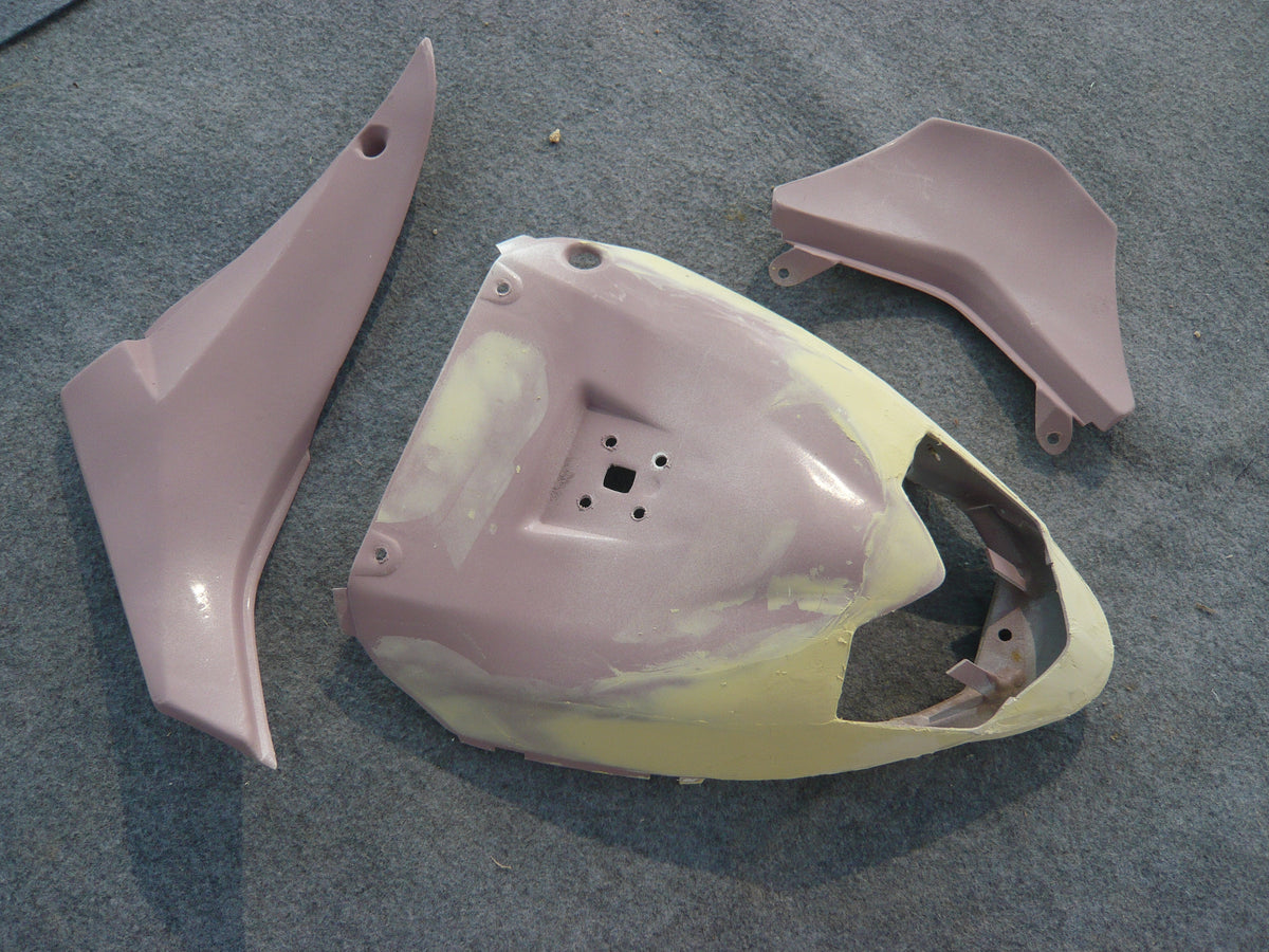 NiceFairings production photograph of separate tail-shaped panels during surface preparation