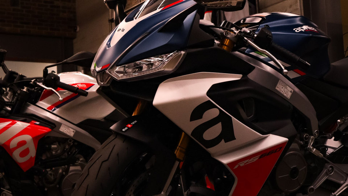 Close-up of modern sport motorcycles showing painted fairing designs
