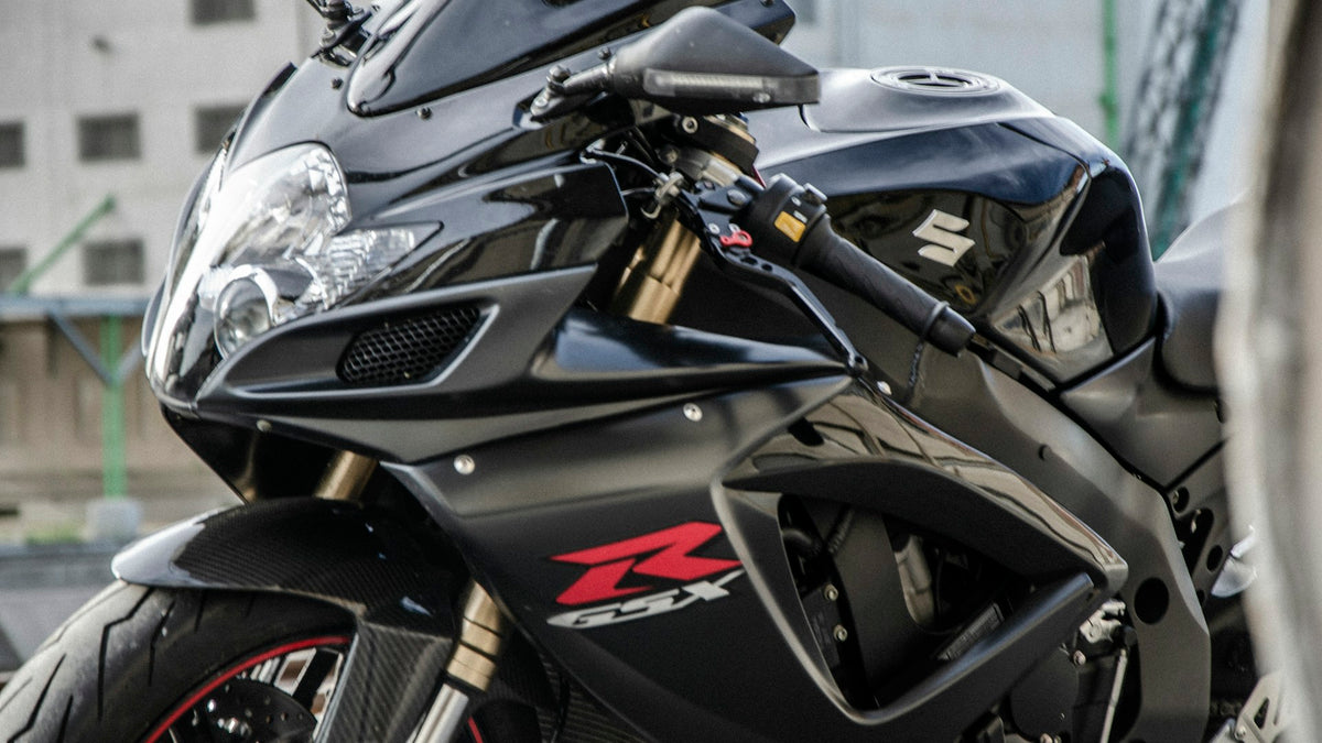 Black Suzuki GSX-R600 sport motorcycle with full aerodynamic fairings