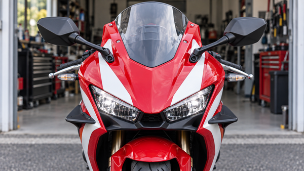 AI editorial illustration of a red and white sportbike front fairing with twin headlights and visible winglets