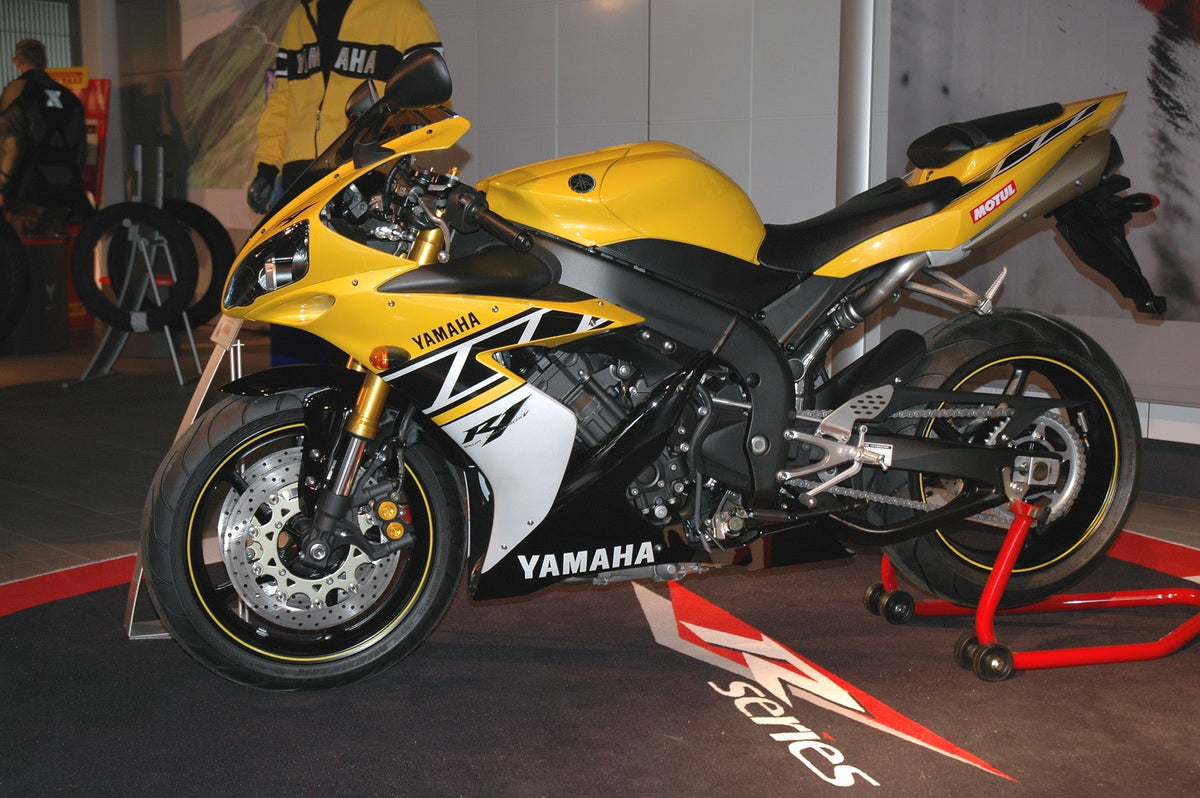 Yellow and black 2006 Yamaha YZF-R1 50th Anniversary motorcycle at a display