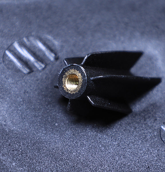NiceFairings production photograph of a threaded insert and molded mounting support on a fairing panel