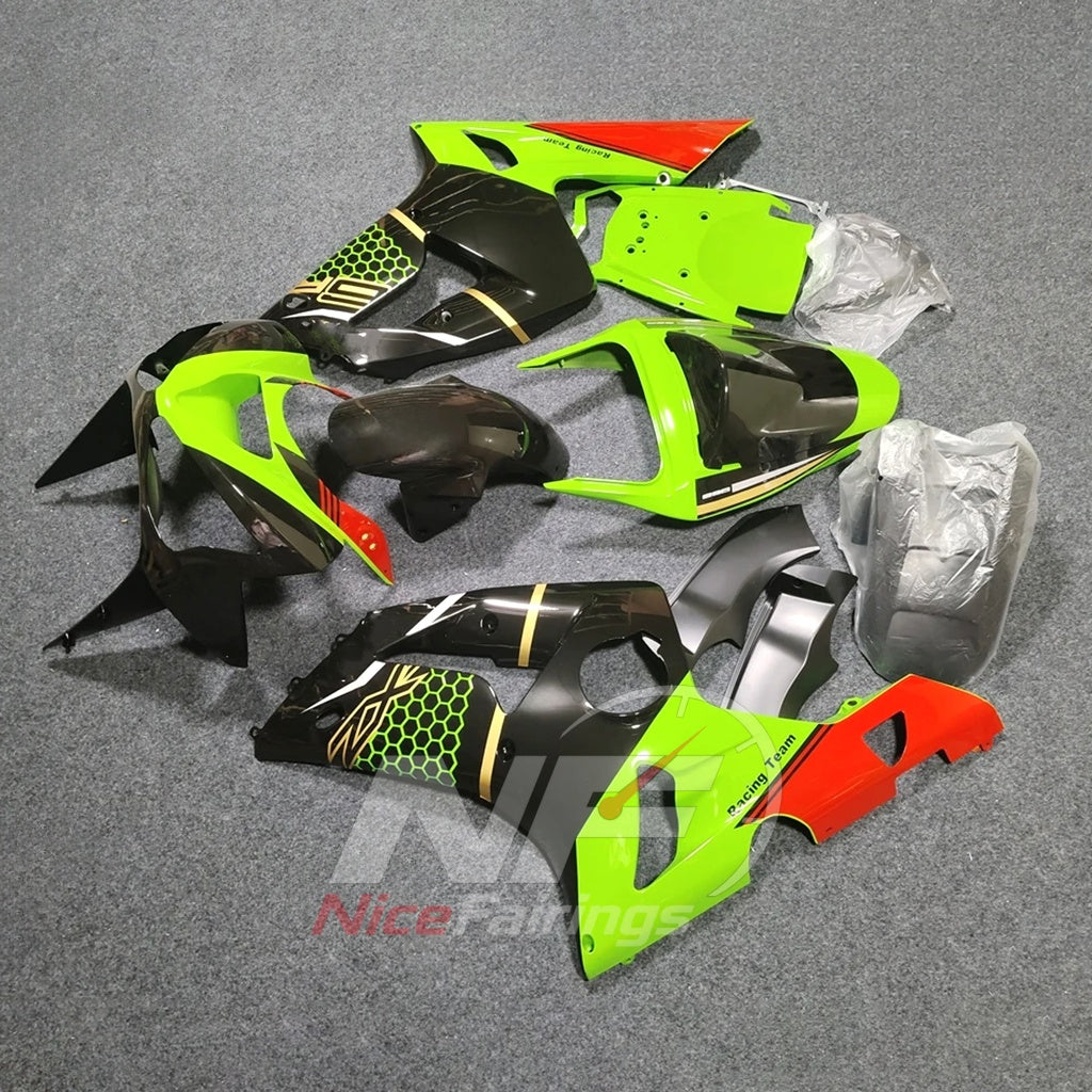 Kawasaki ZX6R 2003-2004 Lime, black and orange racing graphics - angled view