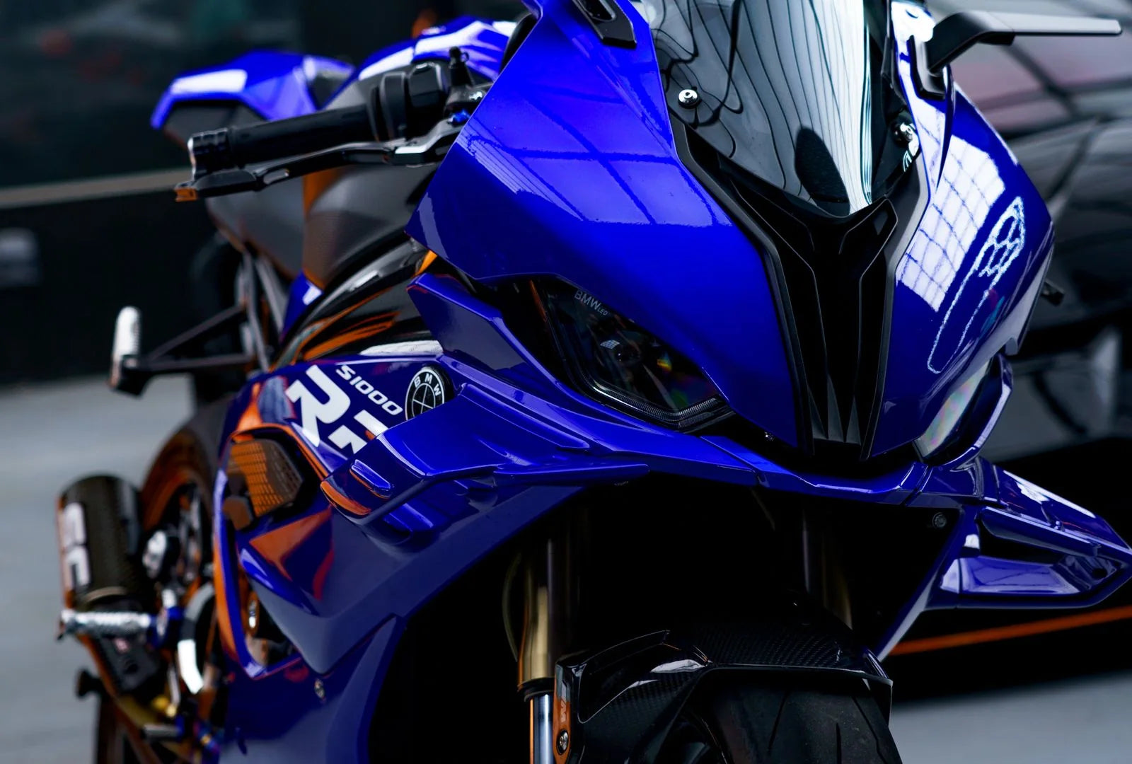 Close-up of the painted fairings on a blue sport motorcycle